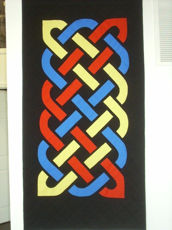 Red, yellow, and blue Celtic Knot Band.