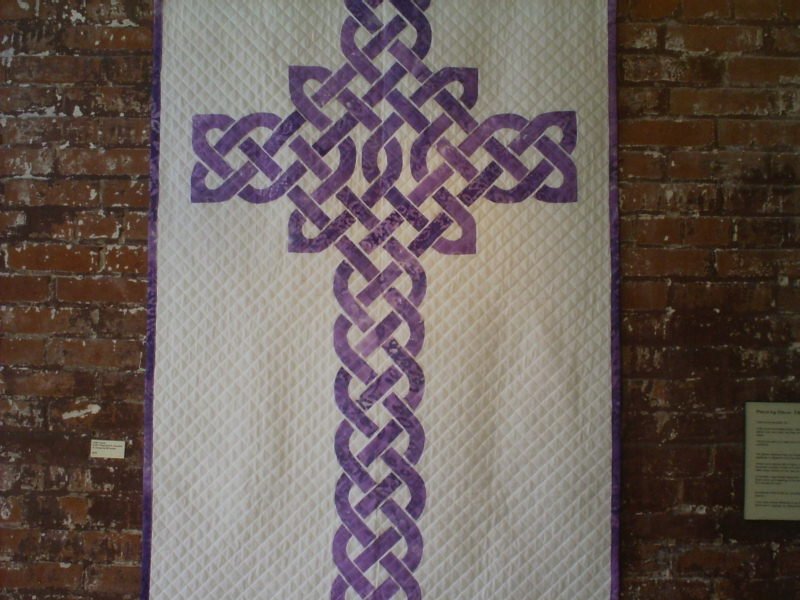 Purple Celtic knot cross.