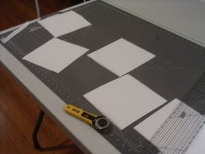 Cutting muslin squares Cutting muslin squares