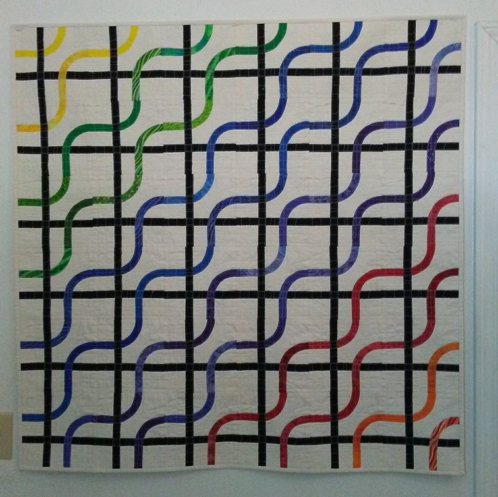 A quilt of straight black lines at right angles interwoven with serpentine-colored lines at 45-degree angle