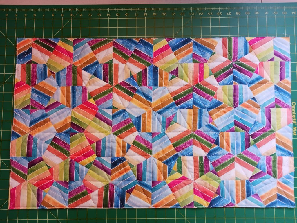 Striped hexagons make abstract design.