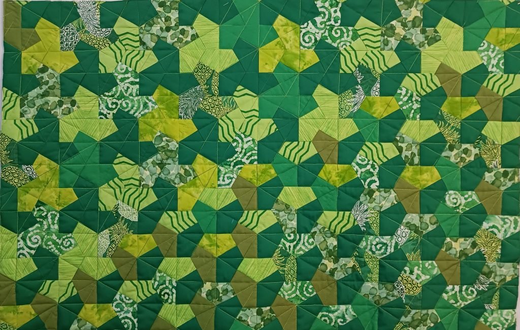 Interlocking propeller shapes morph into 3D blocks.