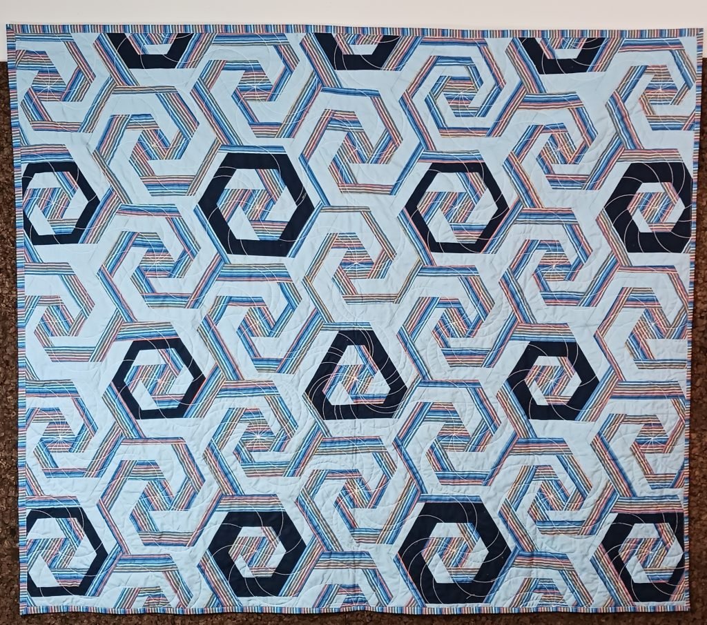 Interlocking spirals (some bordered, some not).