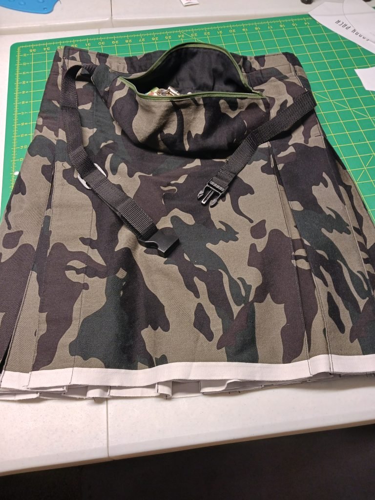 Camoflage kilt and matching fanny pack.