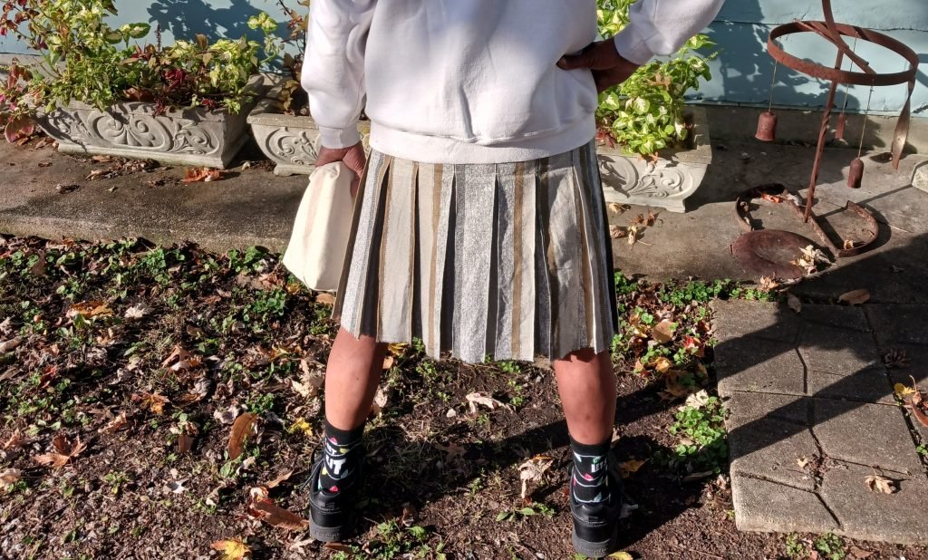 Rear view brown striped kilt.